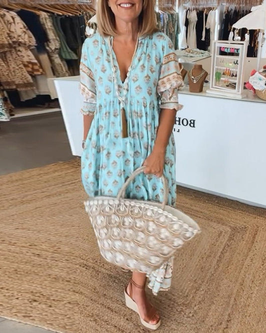 MANA | ROBE MIDI FLORALE CHIC À COL EN V